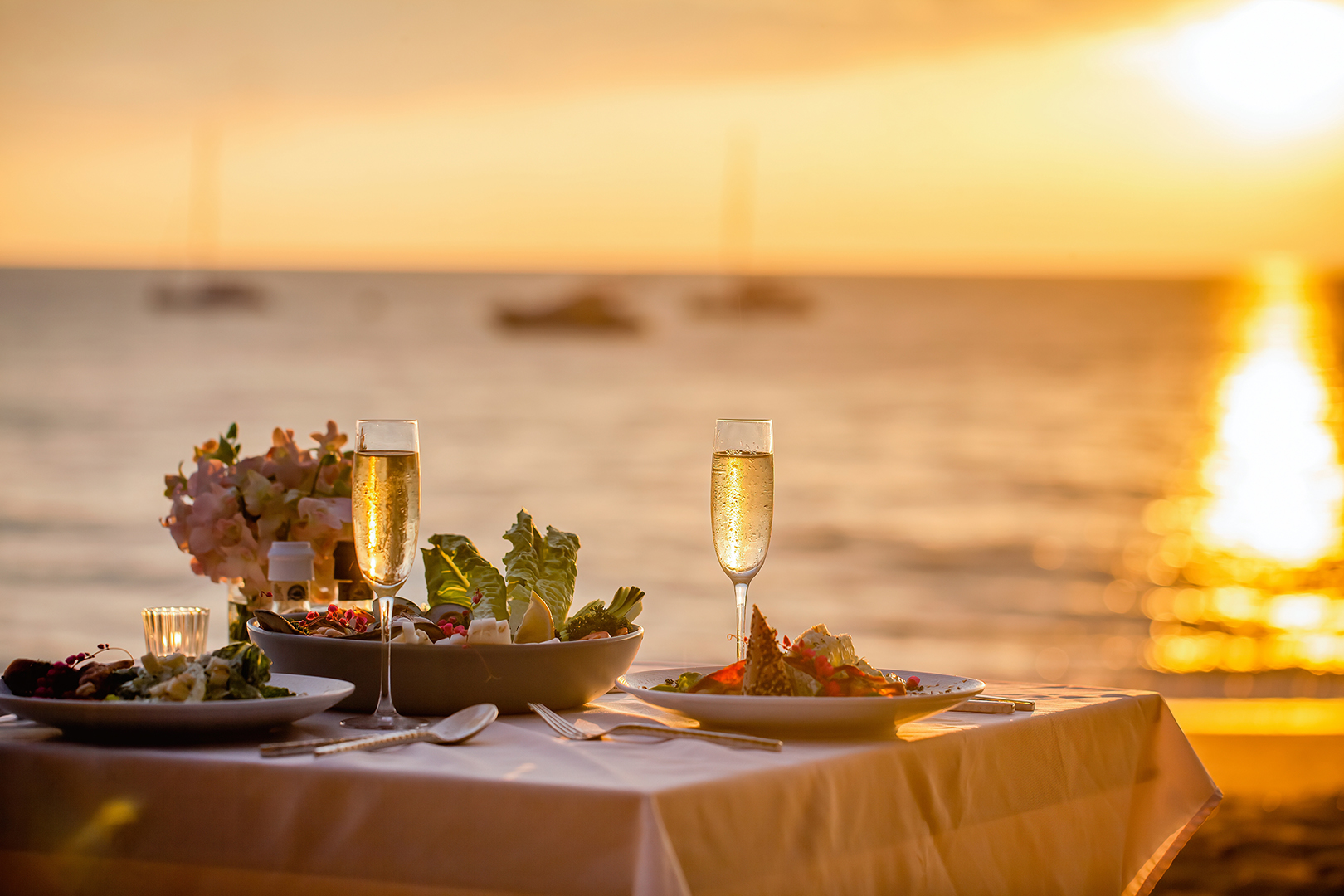 Romantic,Sunset,Dinner,On,The,Beach.,Table,Honeymoon,Set,For